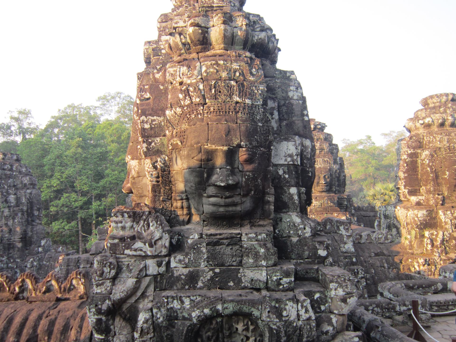 The Bayon temple - huge faces on a pillar at this Buddhist temple in Angkor, Cambodia. 