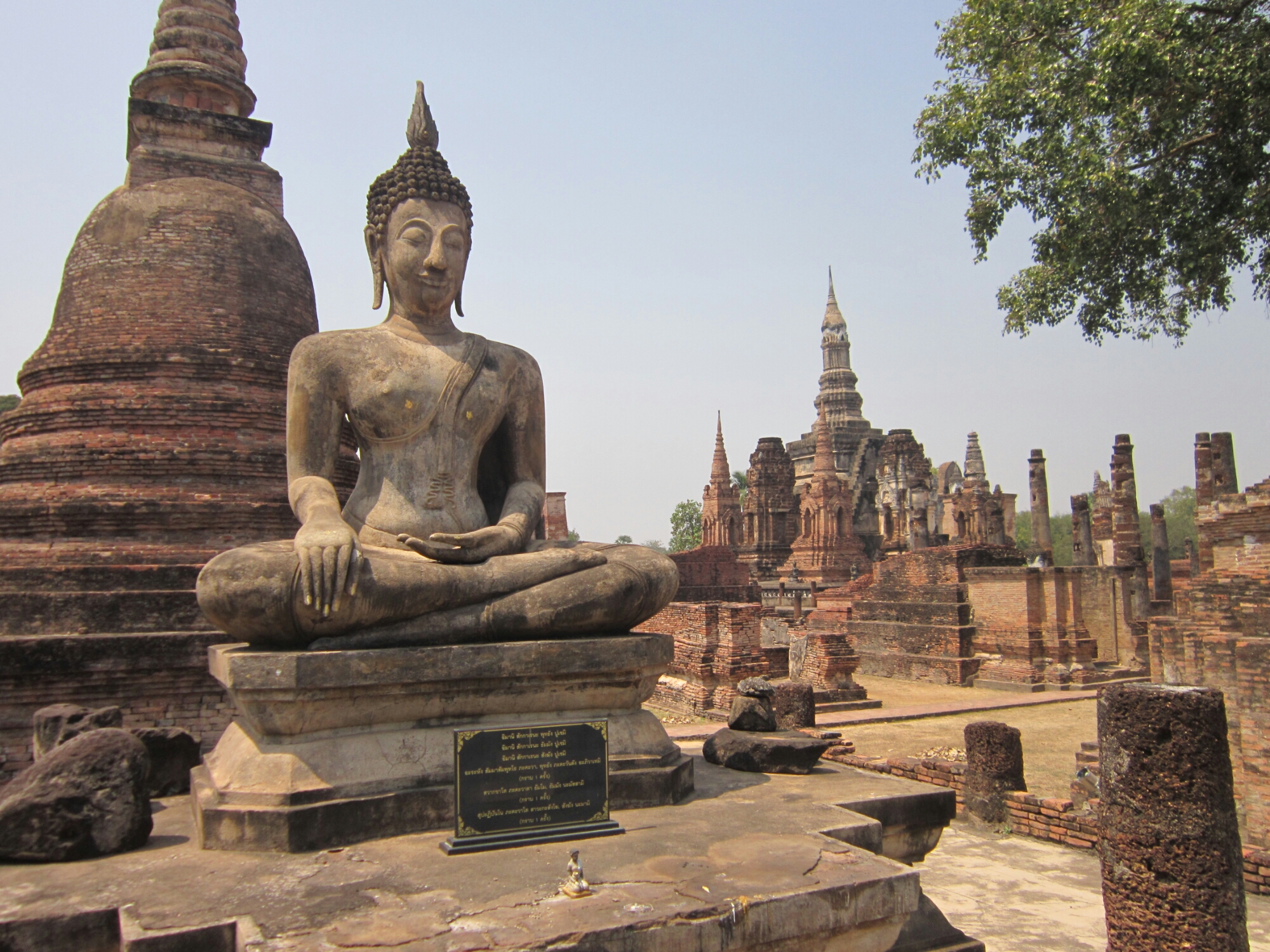 Buddha statue and ruins at Sukhothai Historical Park, Thailand